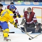 UFA, RUSSIA – DECEMBER 29: Sweden's Elias Lindholm #19 takes a shot on goal against team Latvia during preliminary round action at the 2013 IIHF Ice Hockey U20 World Championship. (Photo by Richard Wolowicz/HHOF-IIHF Images)